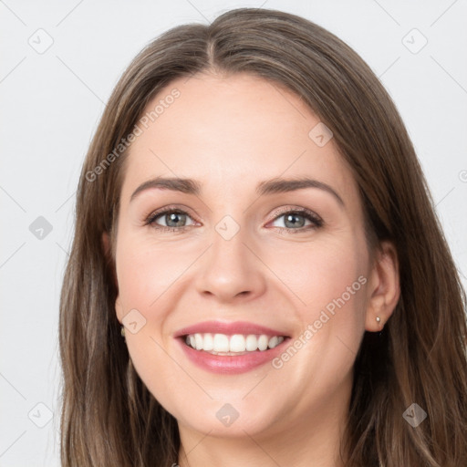 Joyful white young-adult female with long  brown hair and grey eyes