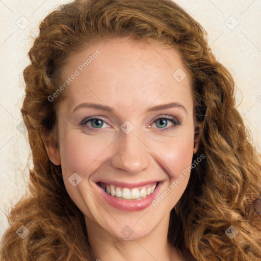 Joyful white young-adult female with long  brown hair and green eyes