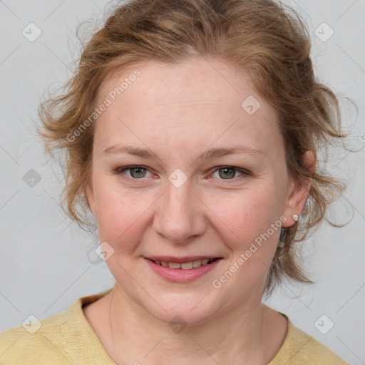 Joyful white young-adult female with medium  brown hair and blue eyes