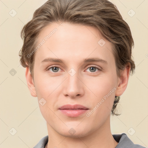 Joyful white young-adult female with short  brown hair and grey eyes