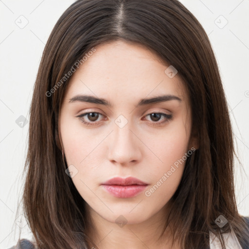 Neutral white young-adult female with long  brown hair and brown eyes