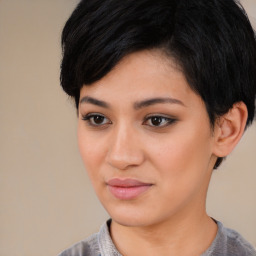 Joyful asian young-adult female with short  black hair and brown eyes