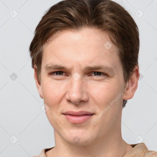 Joyful white adult female with short  brown hair and grey eyes