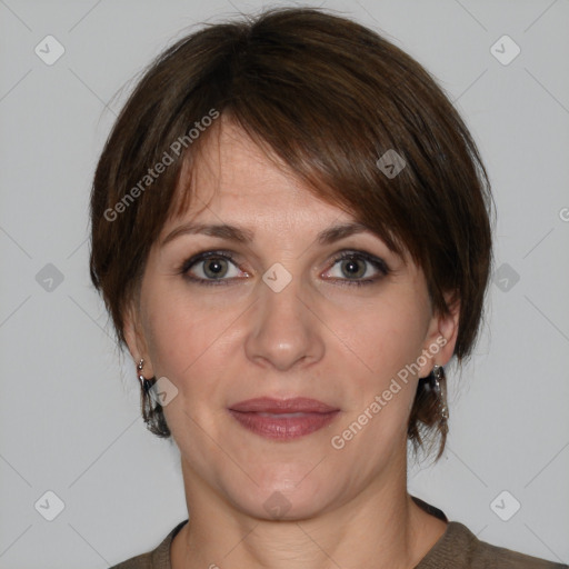 Joyful white adult female with medium  brown hair and grey eyes