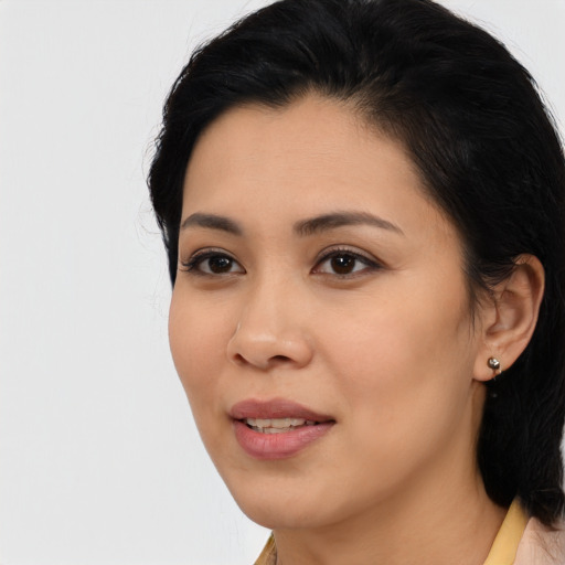 Joyful asian young-adult female with medium  black hair and brown eyes
