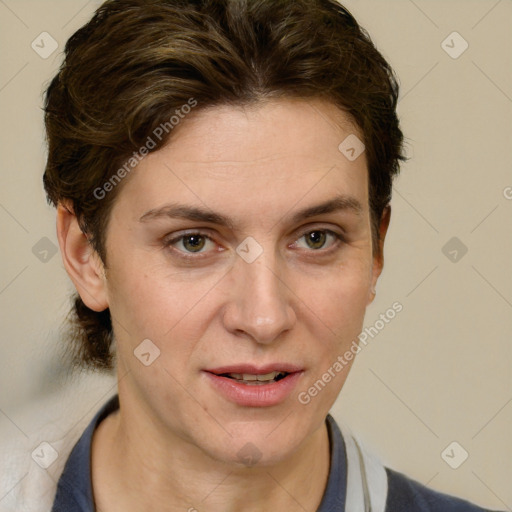 Joyful white adult female with short  brown hair and brown eyes