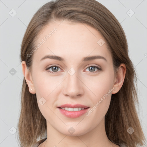 Joyful white young-adult female with long  brown hair and grey eyes