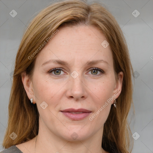 Joyful white adult female with medium  brown hair and blue eyes