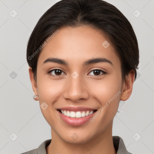 Joyful white young-adult female with short  brown hair and brown eyes