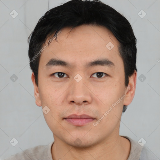 Neutral asian young-adult male with short  black hair and brown eyes