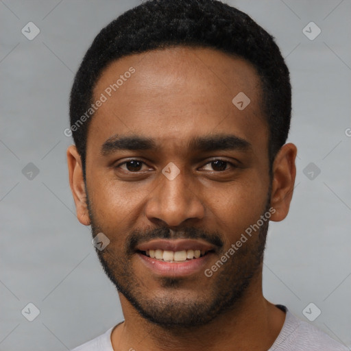 Joyful black young-adult male with short  black hair and brown eyes