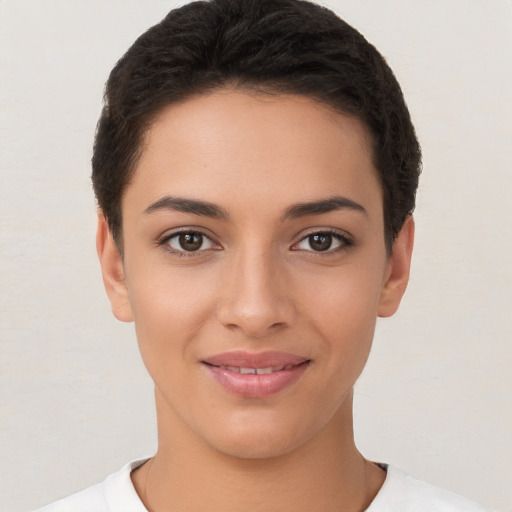 Joyful white young-adult female with short  brown hair and brown eyes