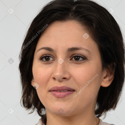 Joyful white young-adult female with medium  brown hair and brown eyes