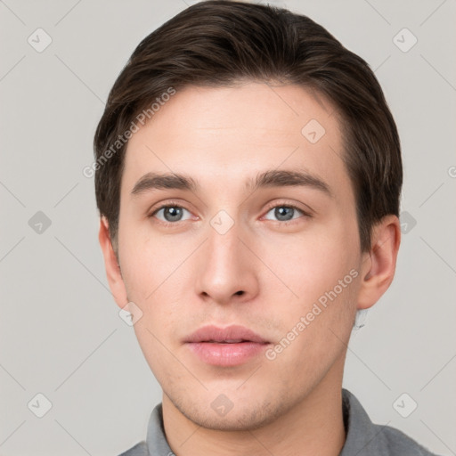 Neutral white young-adult male with short  brown hair and brown eyes