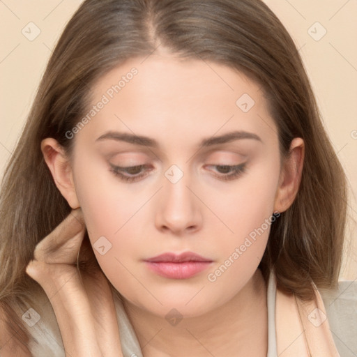 Neutral white young-adult female with long  brown hair and brown eyes