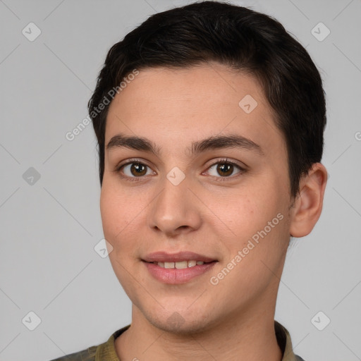 Joyful white young-adult male with short  brown hair and brown eyes