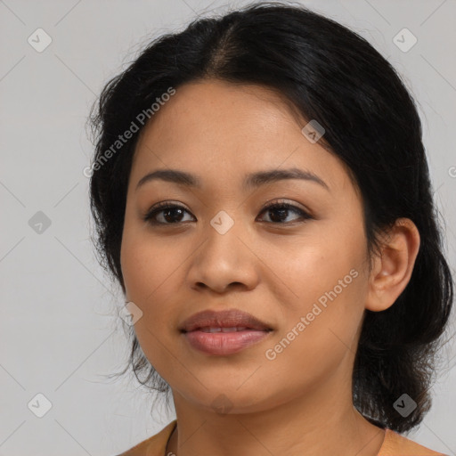 Joyful latino young-adult female with medium  black hair and brown eyes