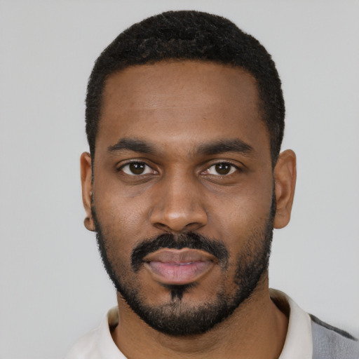 Neutral black young-adult male with short  black hair and brown eyes