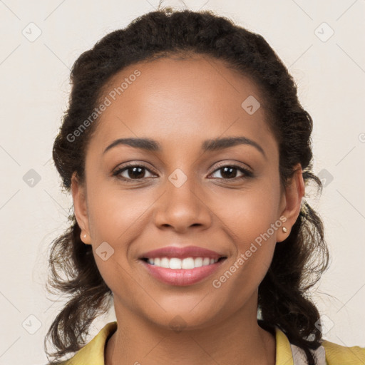 Joyful latino young-adult female with long  brown hair and brown eyes