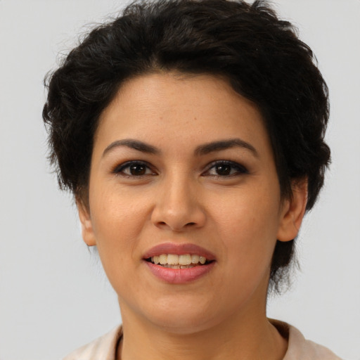 Joyful asian young-adult female with short  brown hair and brown eyes