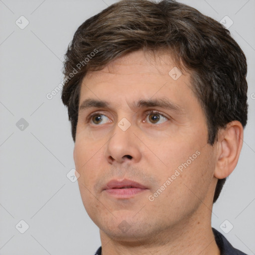 Neutral white adult male with short  brown hair and brown eyes