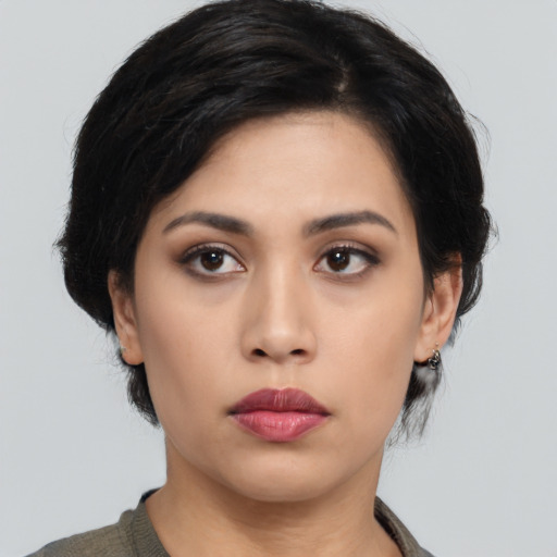 Neutral asian young-adult female with medium  black hair and brown eyes
