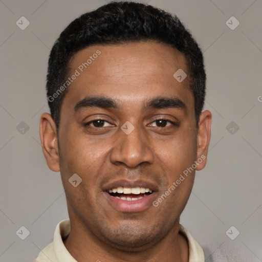 Joyful black young-adult male with short  black hair and brown eyes