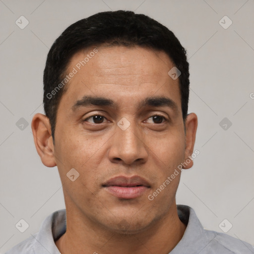 Neutral latino young-adult male with short  black hair and brown eyes