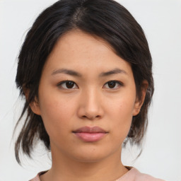 Neutral asian young-adult female with medium  brown hair and brown eyes