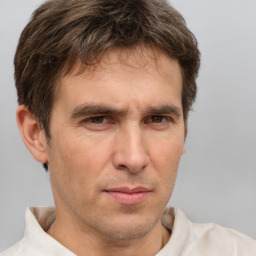 Neutral white adult male with short  brown hair and brown eyes