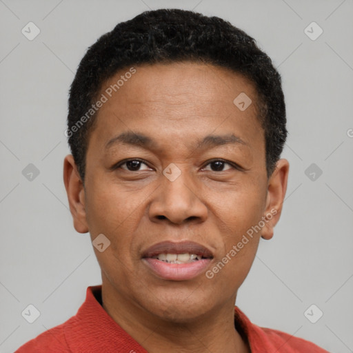 Joyful latino adult male with short  black hair and brown eyes