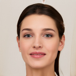 Neutral white young-adult female with short  brown hair and brown eyes