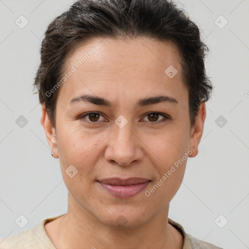 Joyful white adult female with short  brown hair and brown eyes