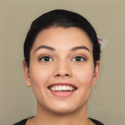 Joyful white young-adult female with short  black hair and brown eyes