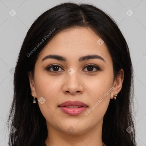 Joyful latino young-adult female with long  brown hair and brown eyes