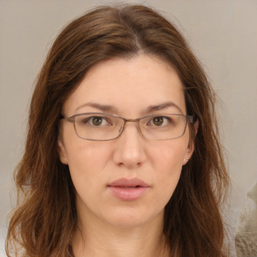 Neutral white adult female with long  brown hair and brown eyes