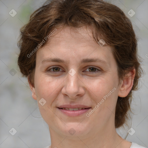 Joyful white young-adult female with medium  brown hair and green eyes