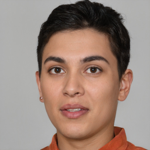 Joyful white young-adult male with short  brown hair and brown eyes