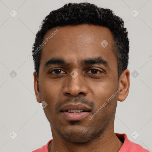 Neutral black young-adult male with short  black hair and brown eyes