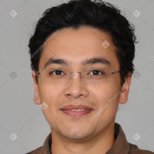 Joyful latino young-adult male with short  brown hair and brown eyes