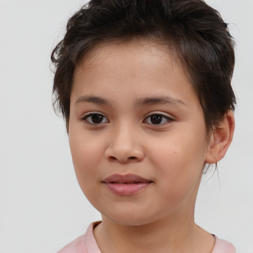 Joyful white child female with medium  brown hair and brown eyes