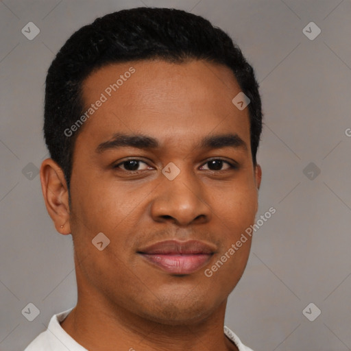 Joyful black young-adult male with short  black hair and brown eyes