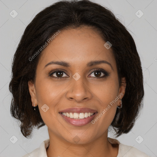 Joyful black young-adult female with medium  brown hair and brown eyes