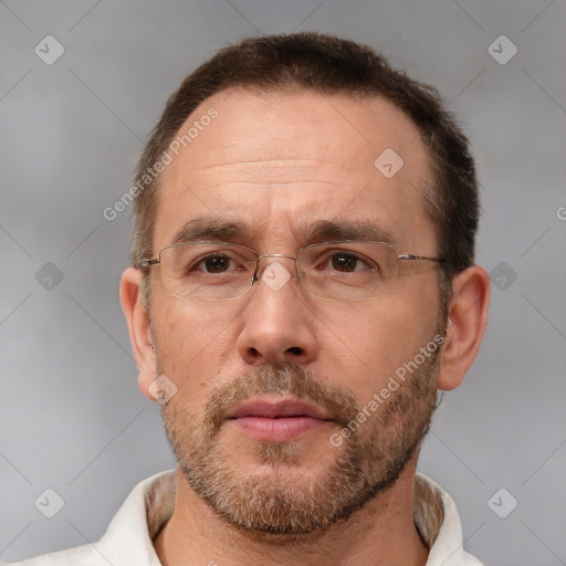 Neutral white adult male with short  brown hair and brown eyes