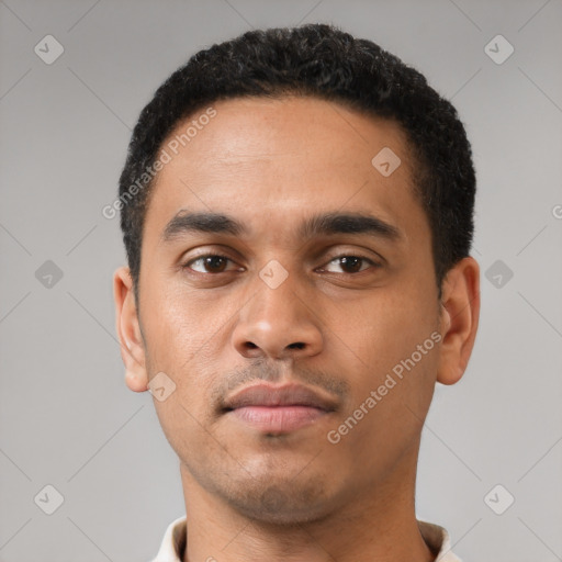 Neutral latino young-adult male with short  black hair and brown eyes