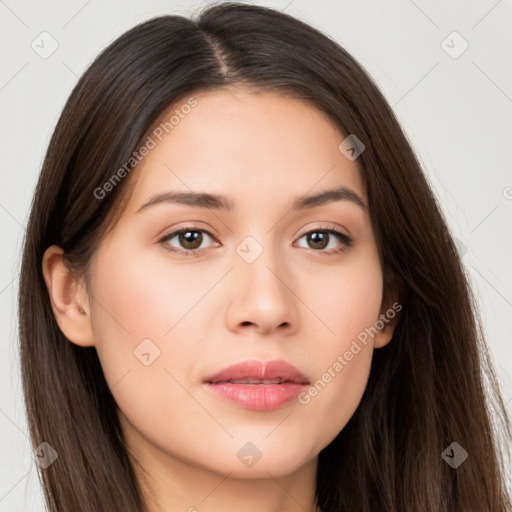 Neutral white young-adult female with long  brown hair and brown eyes