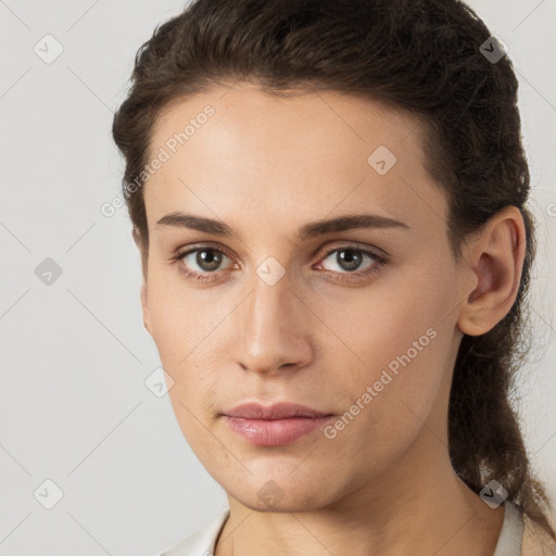 Neutral white young-adult female with medium  brown hair and brown eyes