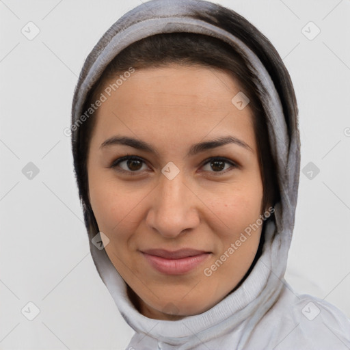 Joyful latino young-adult female with short  brown hair and brown eyes