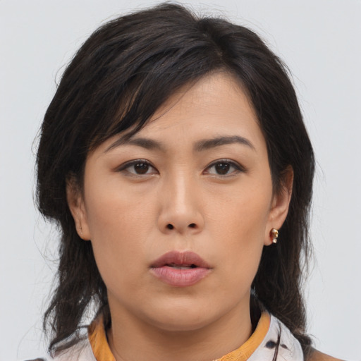 Neutral asian young-adult female with medium  brown hair and brown eyes