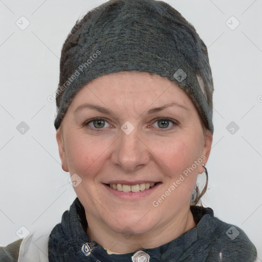 Joyful white adult female with short  brown hair and grey eyes